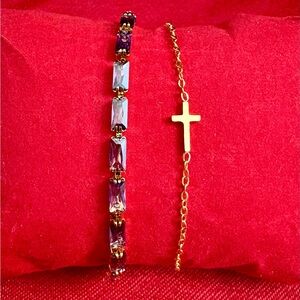 2 18k PVD bracelets. The radiance tennis bracelet and dainty cross bracelet!